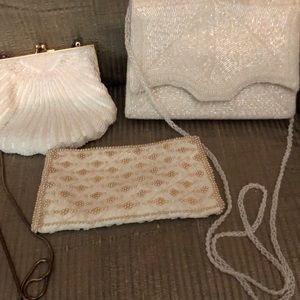 3 white beaded evening bags.